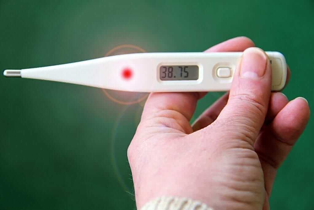 When and how should a child’s temperature be taken?